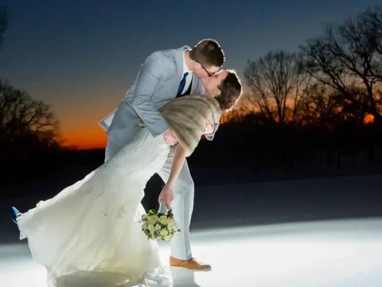 A couple at sunset on the Elgin course on their wedding day